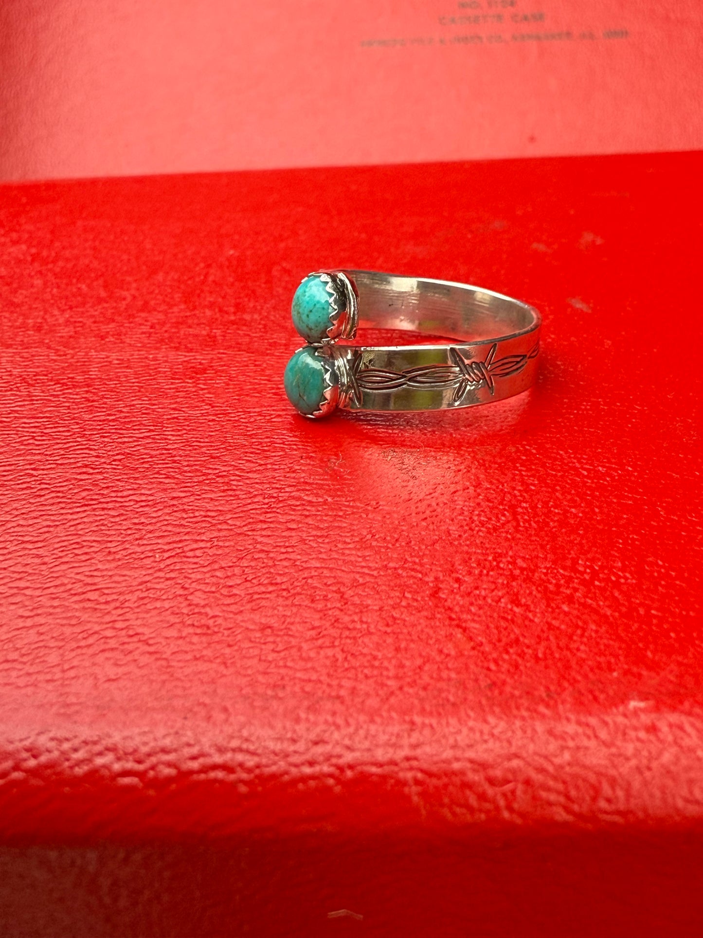 Stamped barbed wire double turquoise